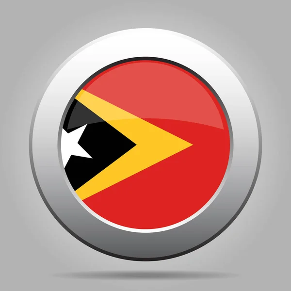 Drapeau du Timor oriental. Bouton rond gris métal brillant . — Image vectorielle