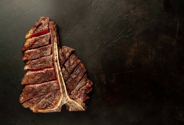 grilled meat on a dark background