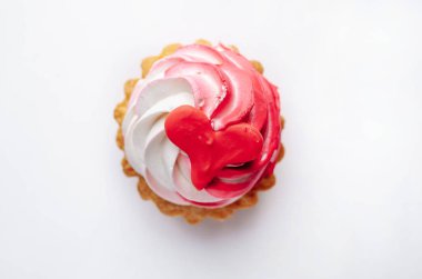 cake with drawings in the form of a heart on a white background for Valentine's day with copy space for your text