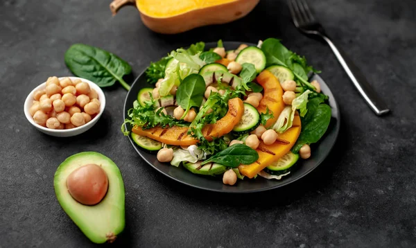 Plate Avocado Salad Chickpeas Pumpkins Cucumbers Poached Eggs Plate Stone — Stok fotoğraf