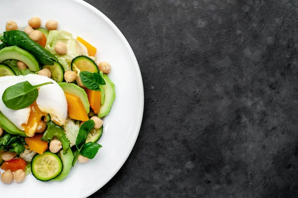 Plate Avocado Salad Chickpeas Pumpkins Cucumbers Poached Eggs Plate Stone — Stok fotoğraf