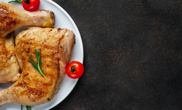 appetizing fried chicken legs on plate