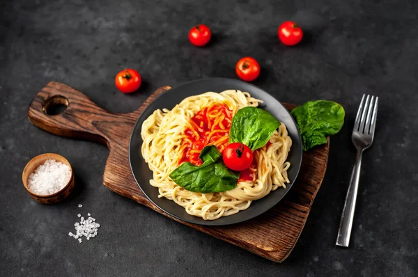 Appetizing Pasta Served Tomatoes Basil Leaves — Stock Photo, Image