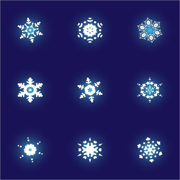 Bausatz aus einfachen, schönen Schneeflocken auf blauem Hintergrund. — Stockfoto