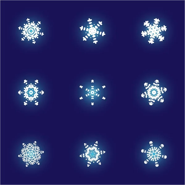 Kit of simple, beautiful snowflakes on blue background. — Stock Photo, Image