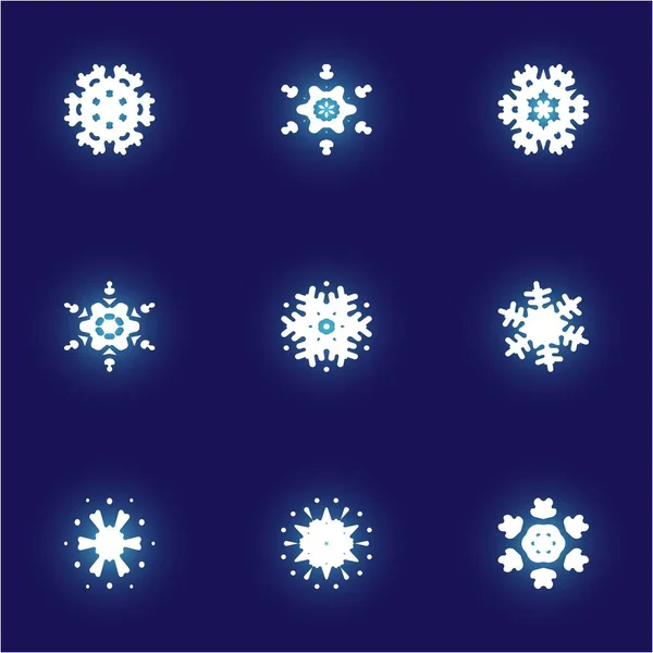 Conjunto de copos de nieve aislados sobre fondo azul . — Foto de Stock