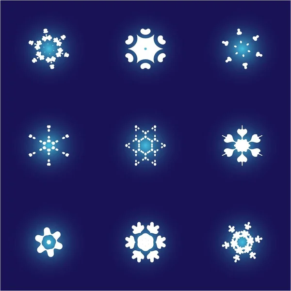 Colección de simples copos de nieve sobre fondo azul . —  Fotos de Stock