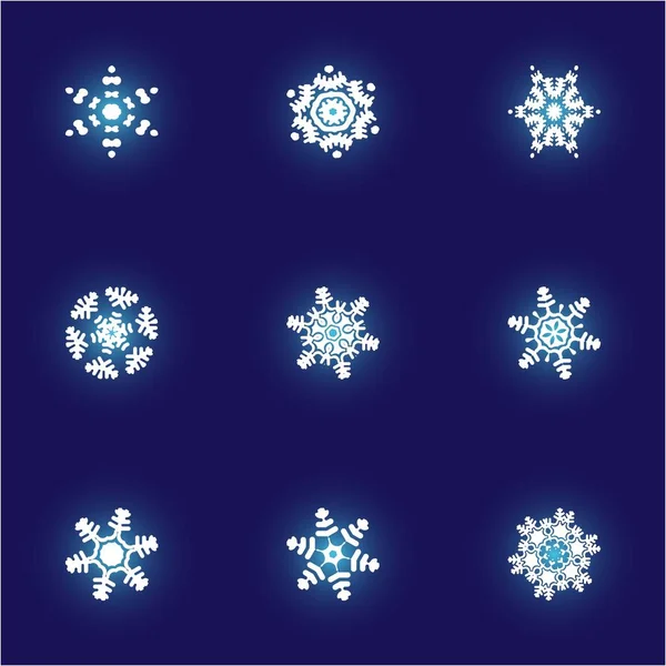 Collection of paper cut isolated snowflakes on blue background. — Stock Photo, Image