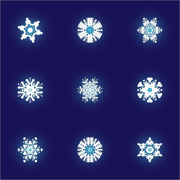 Сборник бумаги вырезать изолированные снежинки на голубом фоне . — стоковый вектор