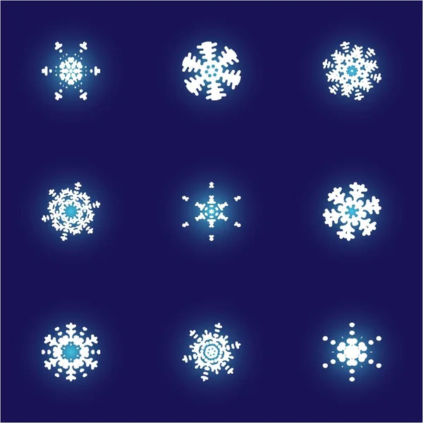 Colección de copos de nieve aislados cortados en papel sobre fondo azul . — Vector de stock