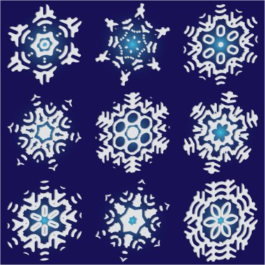 Mavi arka planda basit, güzel kar taneleri.. 