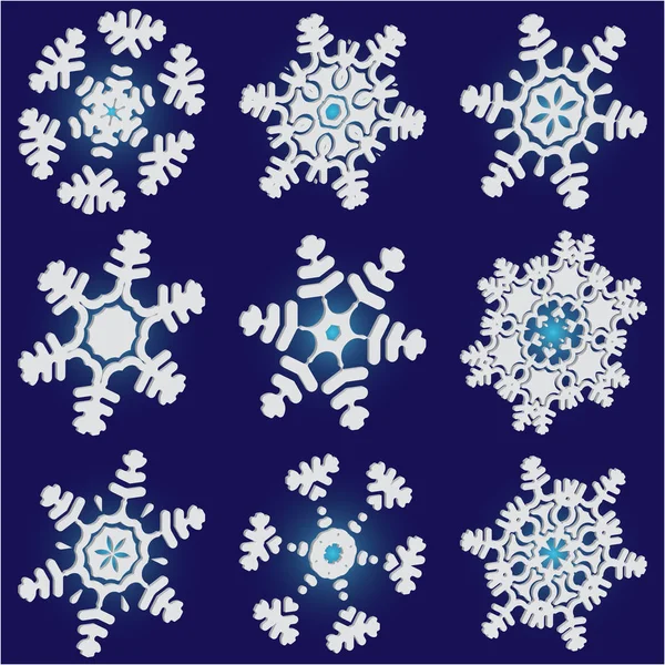 Ensemble de flocons de neige en papier de Noël sur fond bleu . — Image vectorielle