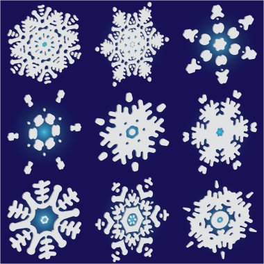 Mavi arka planda basit, güzel kar taneleri.. 