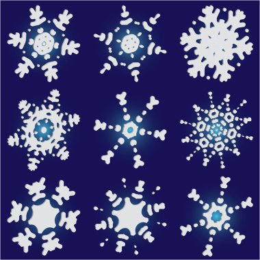 Mavi zemin üzerinde izole kar taneleri kesilmiş kağıt koleksiyonu. 