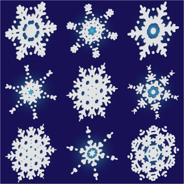 Conjunto de copos de nieve de Navidad 3d sobre fondo azul . — Vector de stock