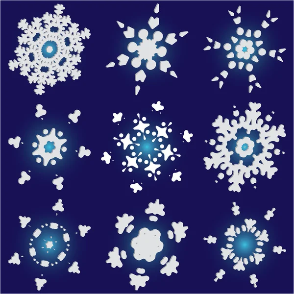 Collection de flocons de neige simples sur fond bleu . — Image vectorielle