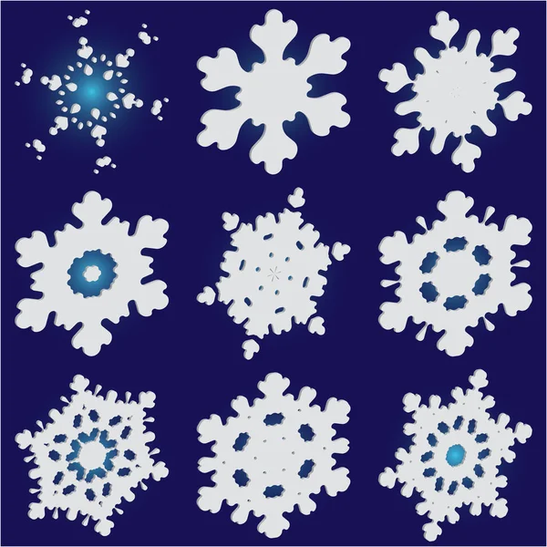Conjunto de flocos de neve caídos isolados sobre fundo azul . — Vetor de Stock