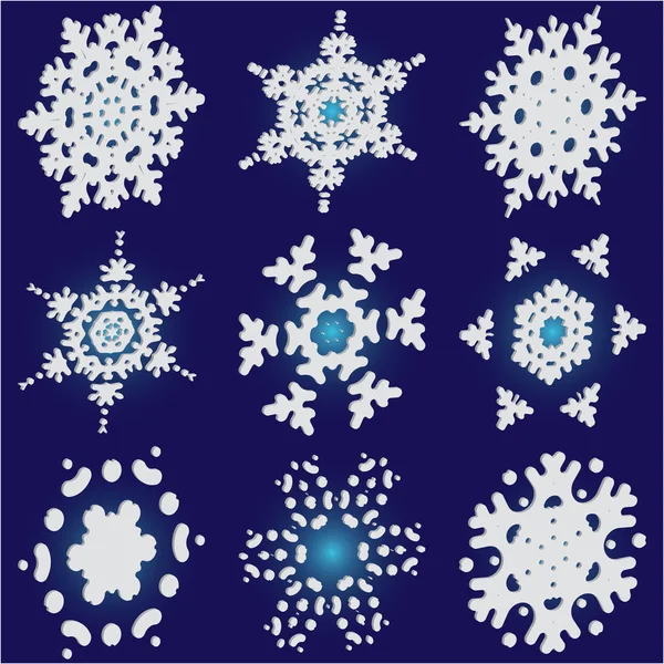 Conjunto de copos de nieve de Navidad 3d sobre fondo azul . — Vector de stock