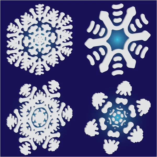 Conjunto de copos de nieve de papel navideño sobre fondo azul . — Vector de stock