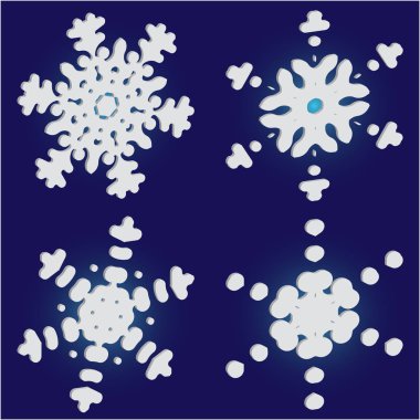 Mavi arkaplanda düşen izole kar taneleri kümesi. 
