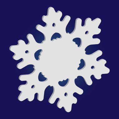 Mavi arkaplanda yalıtılmış düşen kar tanesi.