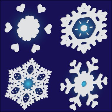 Mavi arkaplanda düşen izole kar taneleri kümesi. 