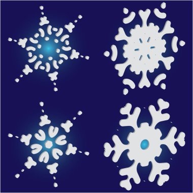 Mavi arkaplanda düşen izole kar taneleri kümesi. 