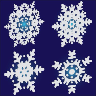 Mavi arka planda izole edilmiş kar taneleri siluetleri.. 