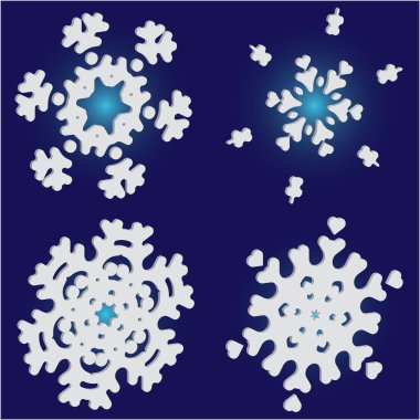 Mavi arkaplanda düşen izole kar taneleri kümesi. 