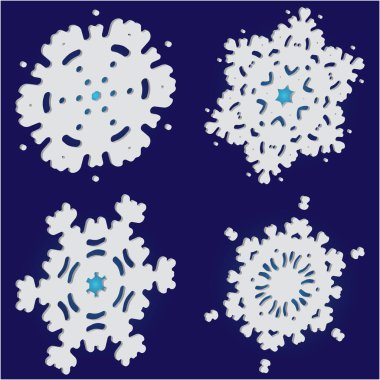 Mavi zemin üzerinde izole kar taneleri kesilmiş kağıt koleksiyonu. 