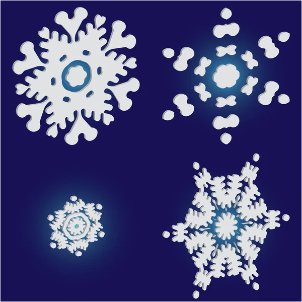 Set of christmas paper snowflakes on blue background. — Stock Vector