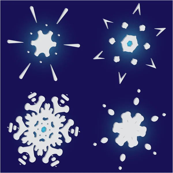 Ensemble de flocons de neige en papier de Noël sur fond bleu . — Image vectorielle