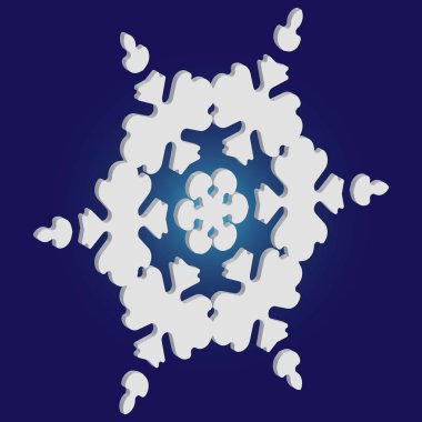 Mavi arka planda Noel kâğıdı kar tanesi.