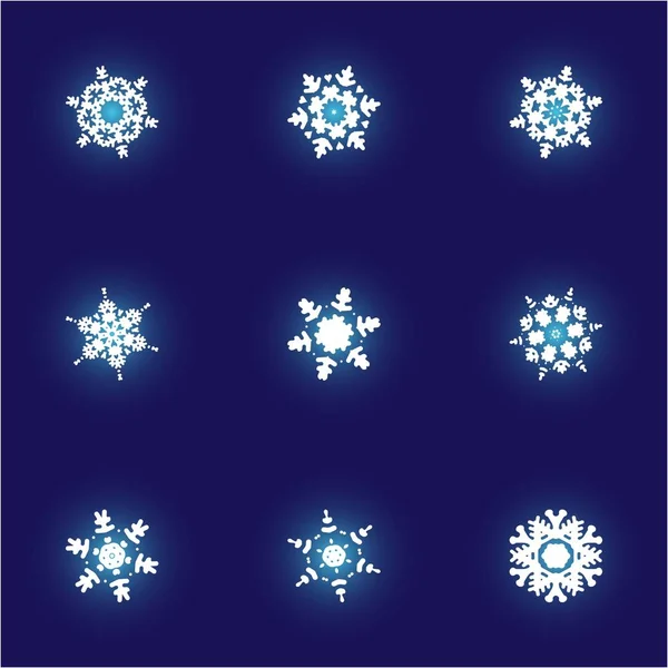 Набір простих різдвяних сніжинок на синьому фоні . — стоковий вектор