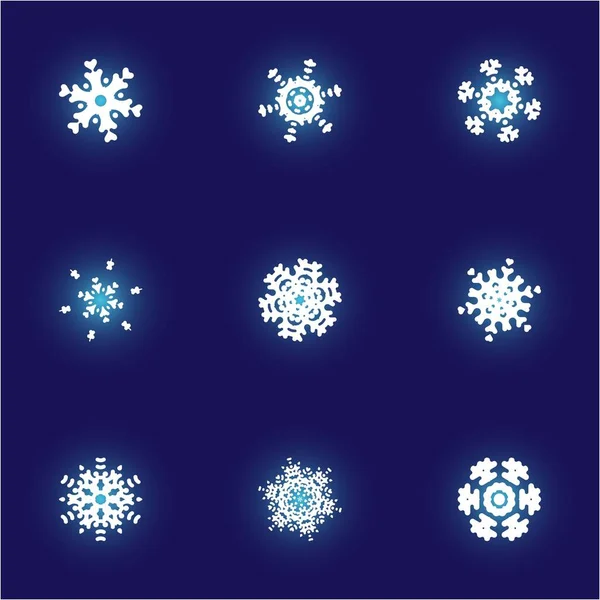 Kit de siluetas aisladas de copos de nieve sobre fondo azul . — Archivo Imágenes Vectoriales