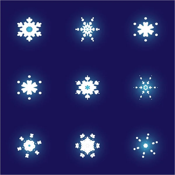 Conjunto de copos de nieve de papel navideño sobre fondo azul . — Vector de stock