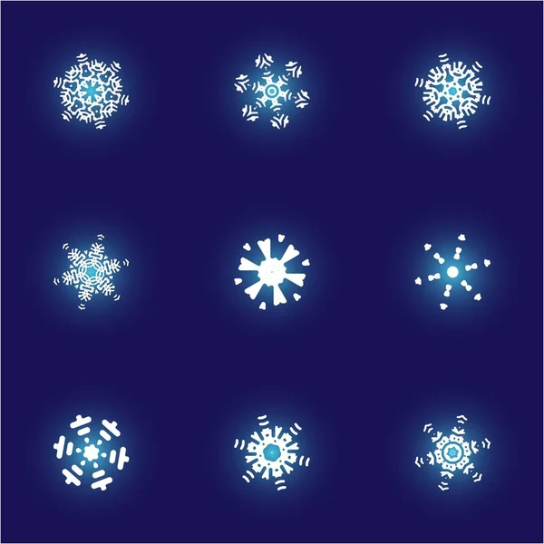 Conjunto de copos de nieve de papel navideño sobre fondo azul . — Archivo Imágenes Vectoriales