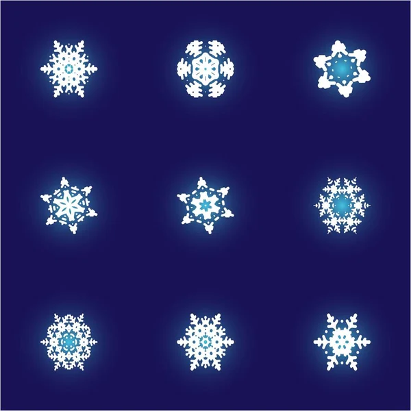 Набор простых, красивых снежинок на синем фоне . — стоковый вектор