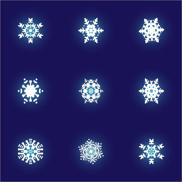 Mavi arka planda kesilmiş bir dizi Noel kar taneleri. — Stok Vektör