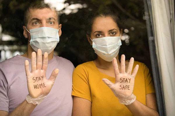 Couple Wearing Face Masks Sanitary Gloves Says Stay Home Stay — Stock Photo, Image