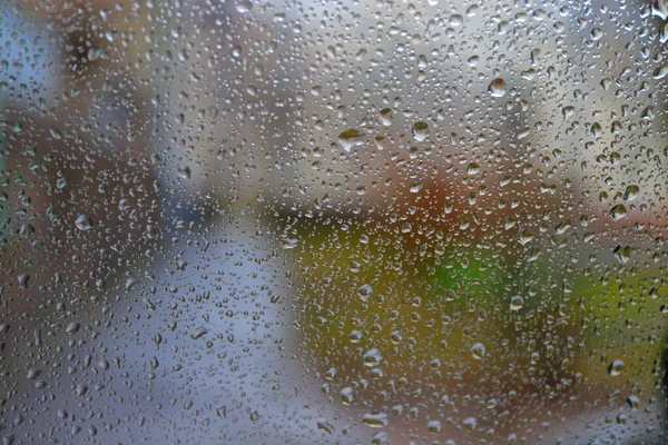 The city behind wet glass — Stock Photo, Image