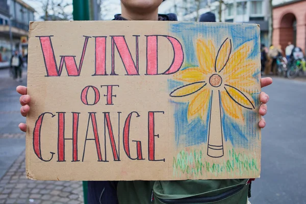 Fridays for Future demonstration in Mainz on January 17, 2020 where a young man is holding his selfmade poster — Stock Photo, Image