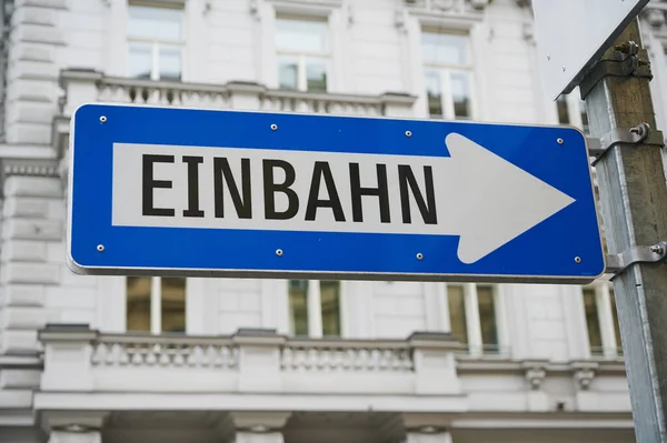 blue street sign in Vienna, Austria with the German word for \