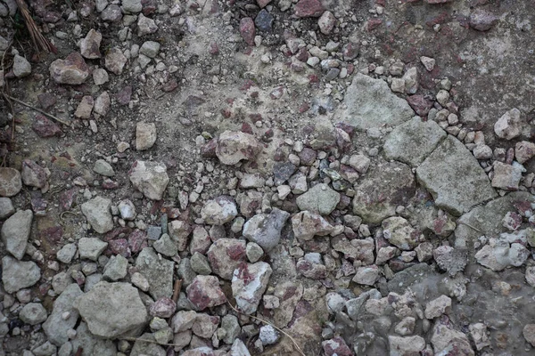 Crushed stone and multi-colored stones close-up element for the designer. Background like texture