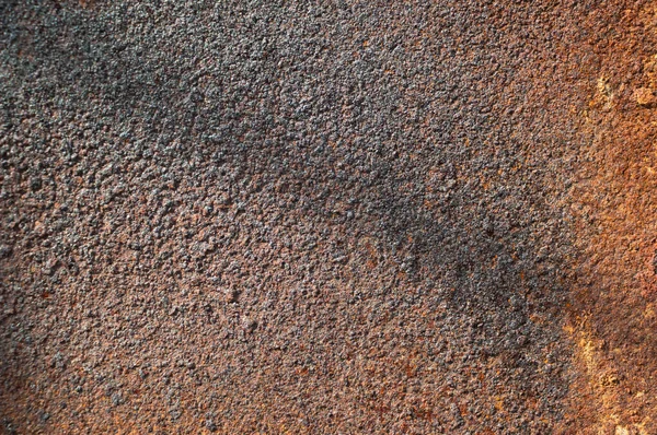 Dark brown rust. Element for the designer, close-up. Background as a texture. full fram