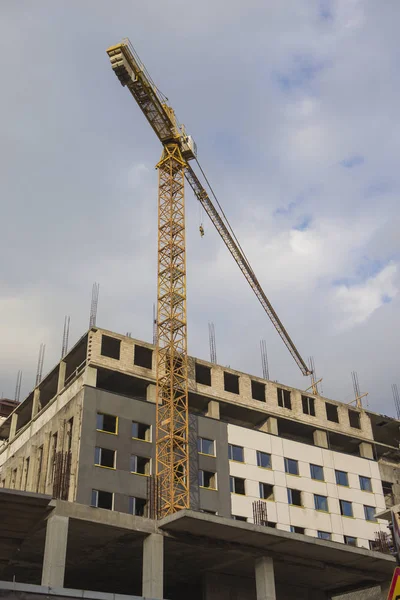 Building and Construction Concepts. Construction Building Site With Industrial Mid-Size Crane.