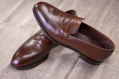 Ayakkabı kavram ve fikirler. Kahverengi şık deri Penny mokasen ayakkabı