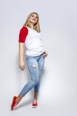 Portrait of Positive Caucasian Girl Posing Indoors in Casual Clothing