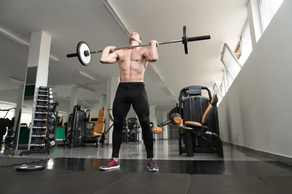 Healthy Man Doing Exercise Barbell Squat — Stock Photo, Image