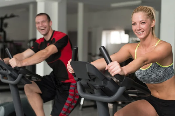 Healthy People On Bicycle In Fitness Gym — Stock Photo, Image